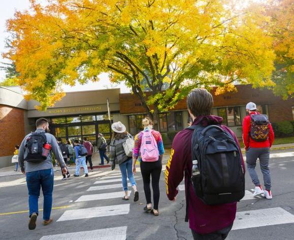 students walk to class on the Sacramento campus